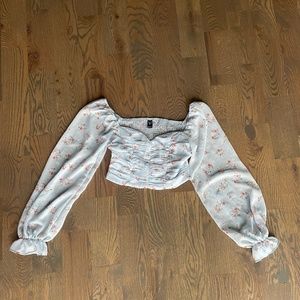 light blue floral blouse